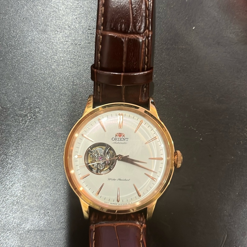Orient Bambino Open Heart gold & brown. Like new